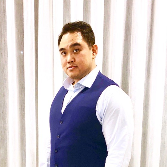 Professional man in formal attire at Canadian Agricultural Safety Association event.